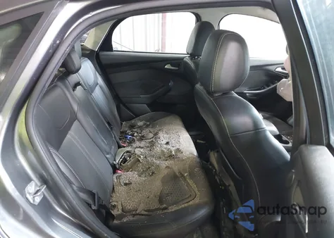 2014 Ford Focus Titanium from USA, damaged, VIN 1FADP3J28EL317034